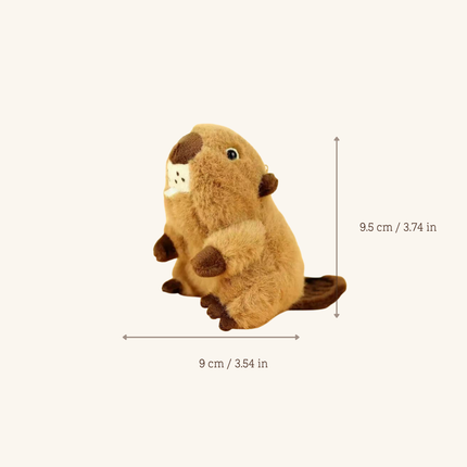 A small brown plush beaver toy centered on a light beige background, with measurement arrows and text showing width as 9 cm / 3.54 in and height as 9.
