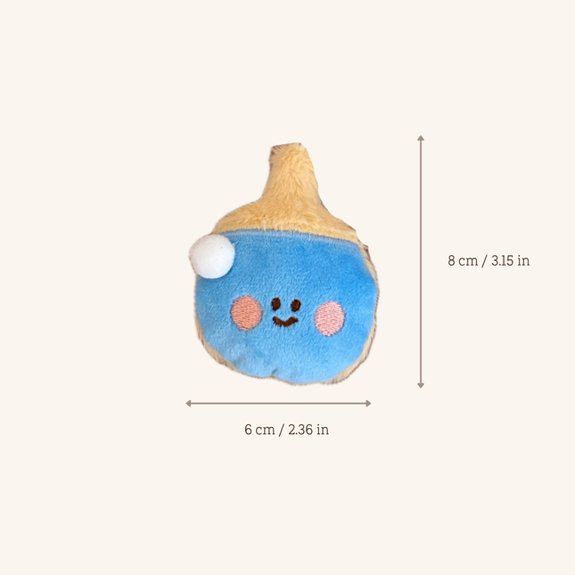 A small plush toy shaped like a stylized fruit or mushroom, shown on a plain light beige background with measurement arrows and text indicating dimensions: 6 cm / 2.36 in wide and 8 cm / 3.