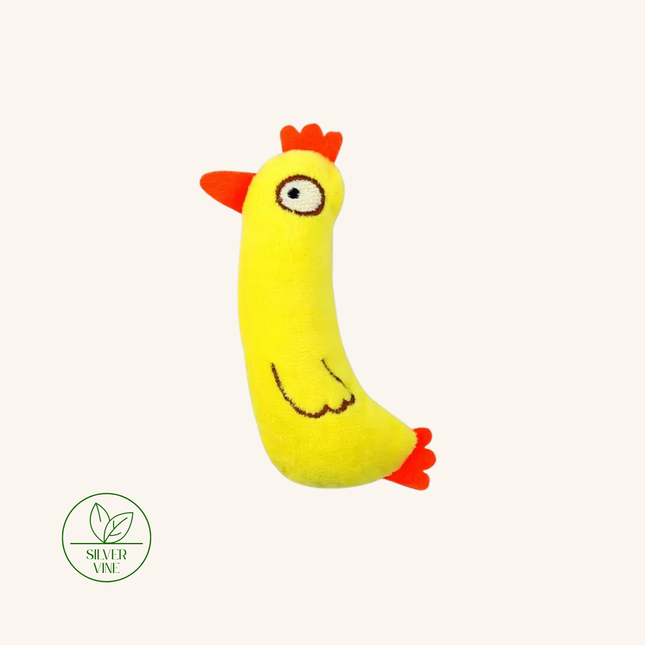 A yellow plush chicken toy with orange beak, comb, and feet, shown on a plain off-white background. A green circular 'SILVER VINE' brand logo is visible in the bottom-left corner.