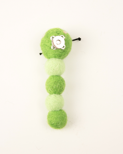 The Wool Baby Caterpillar — Small, Green, and Irresistible to Cats