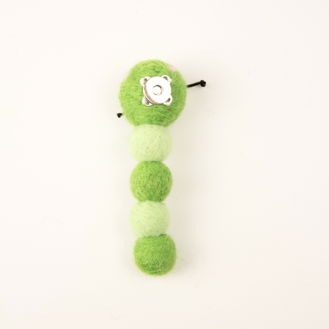 The Wool Baby Caterpillar — Small, Green, and Irresistible to Cats