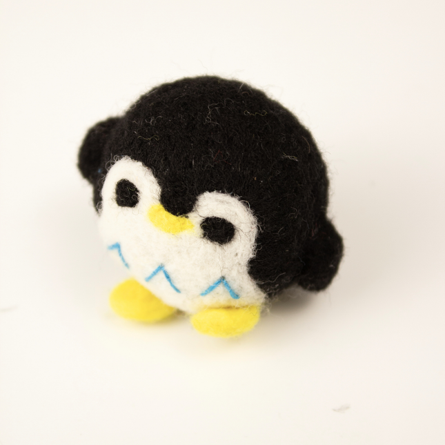 The Wool Penguin — Built to Bat, Chase & Come Back For More